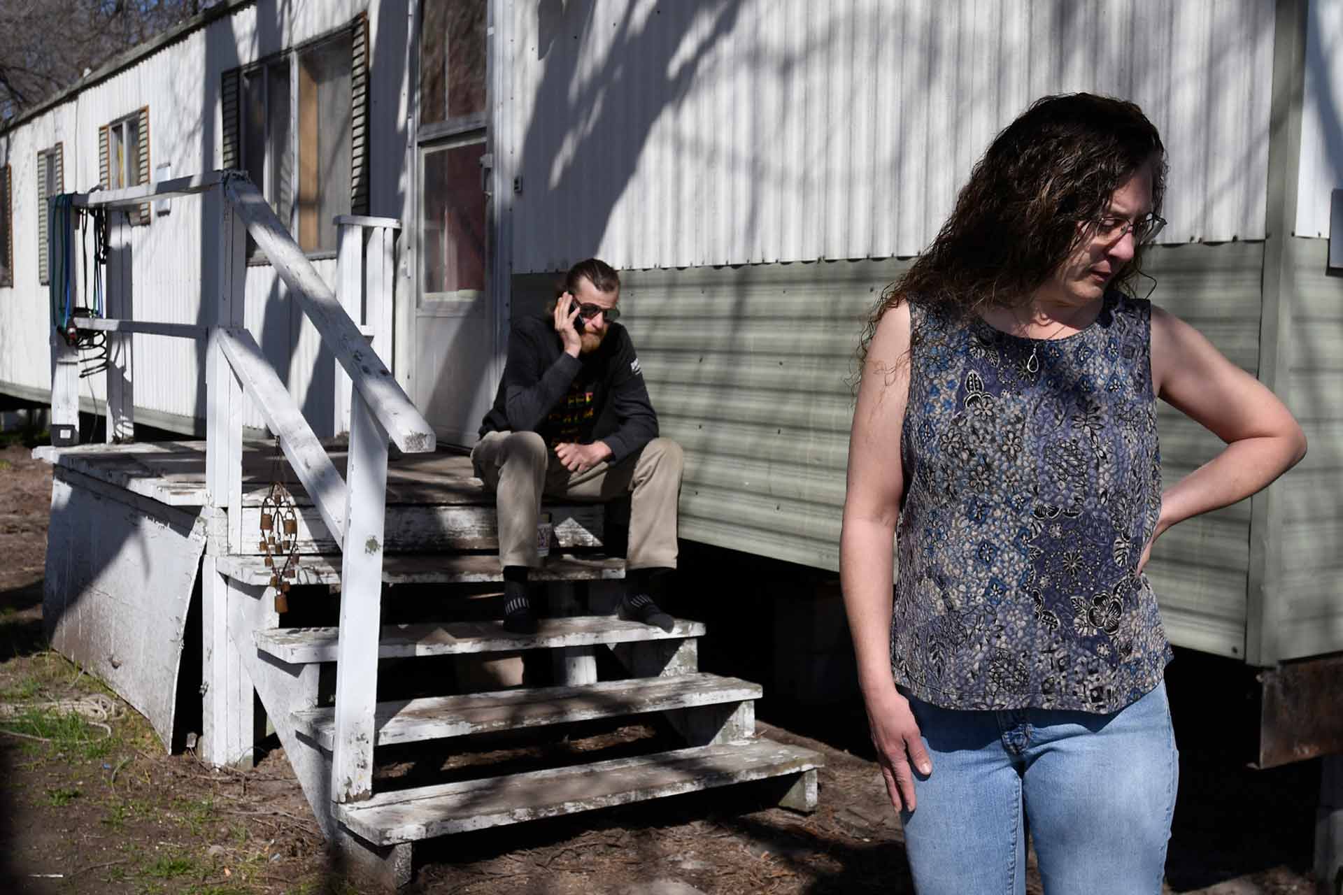 Lena Faulconbridge stands outside her home in Missoula, Montana in 2018. She faced eviction from her trailer court because it was being developed into apartments. (AP Photo/Missoulian, Kurt Wilson)